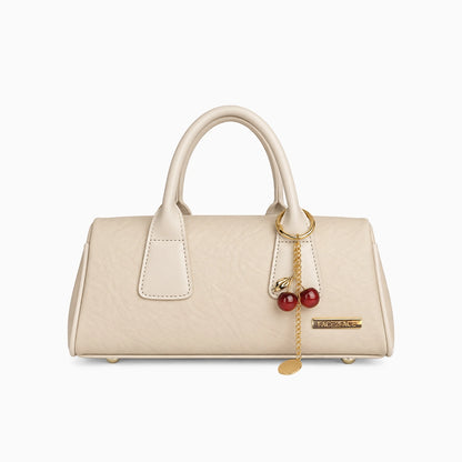 Bolso de mano pequeño en color beige con correa removible