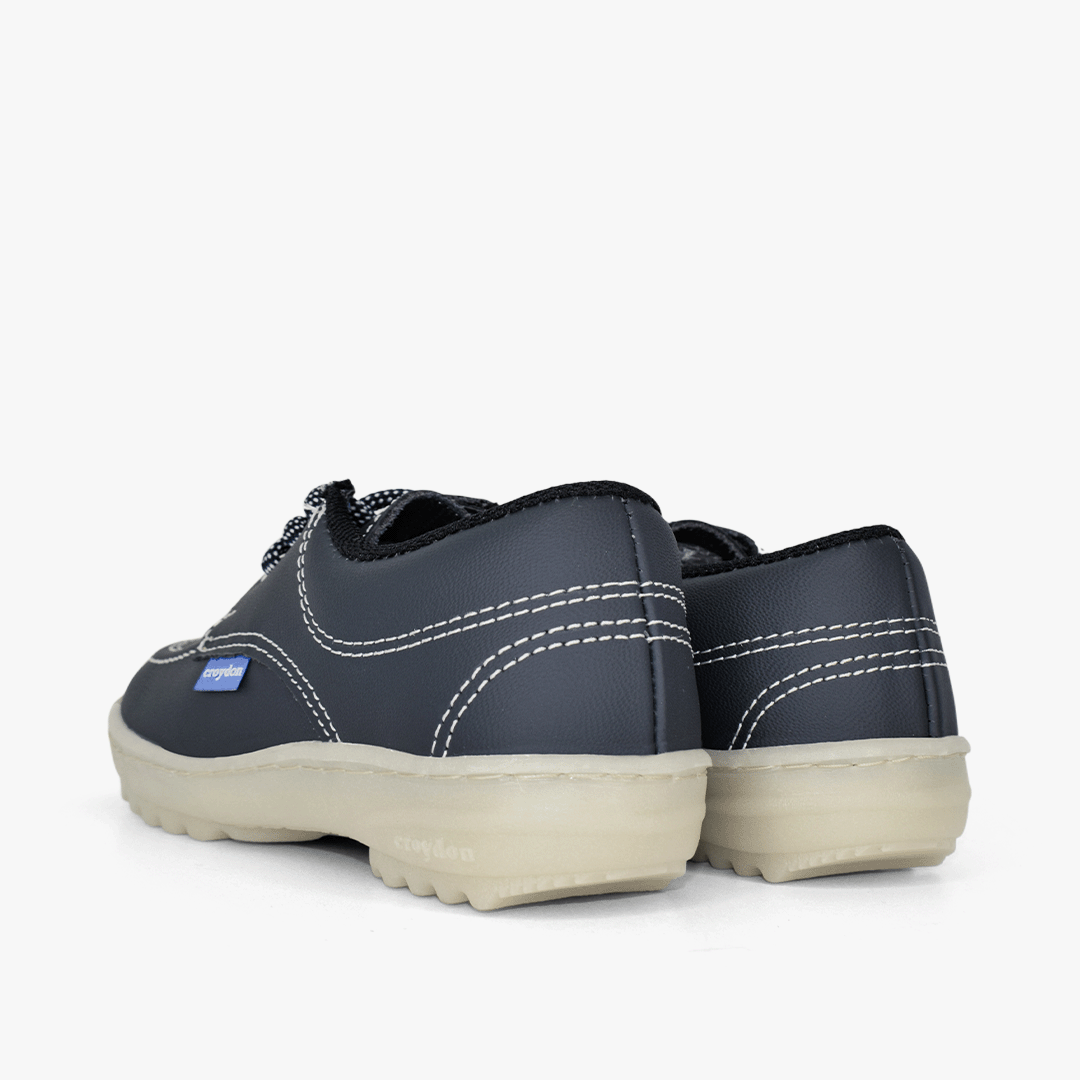 Zapato Croydon colegial unisex en color azul
