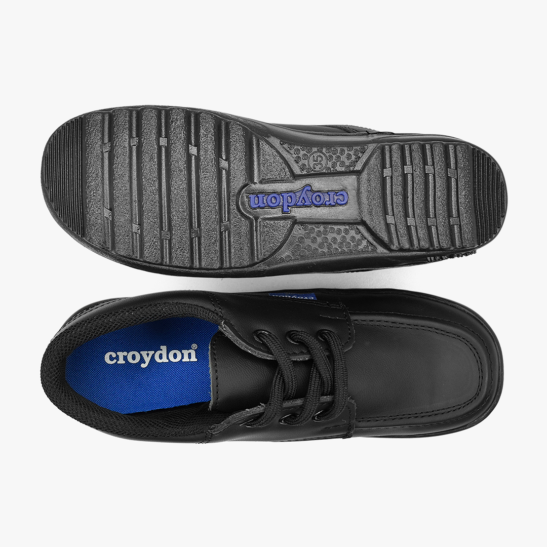 Zapato Croydon colegial unisex en color negro