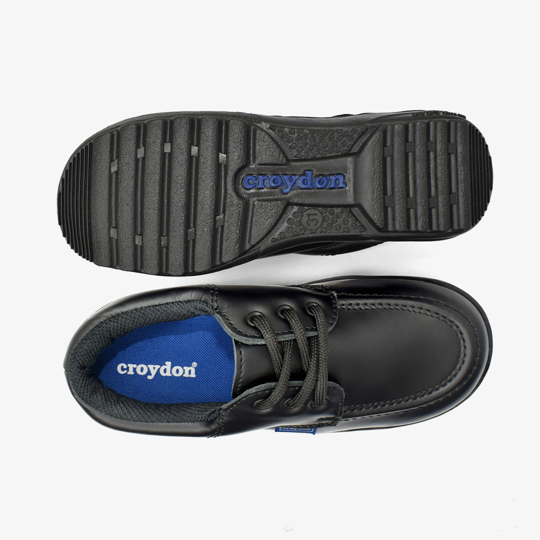 Zapato Croydon colegial unisex en color negro