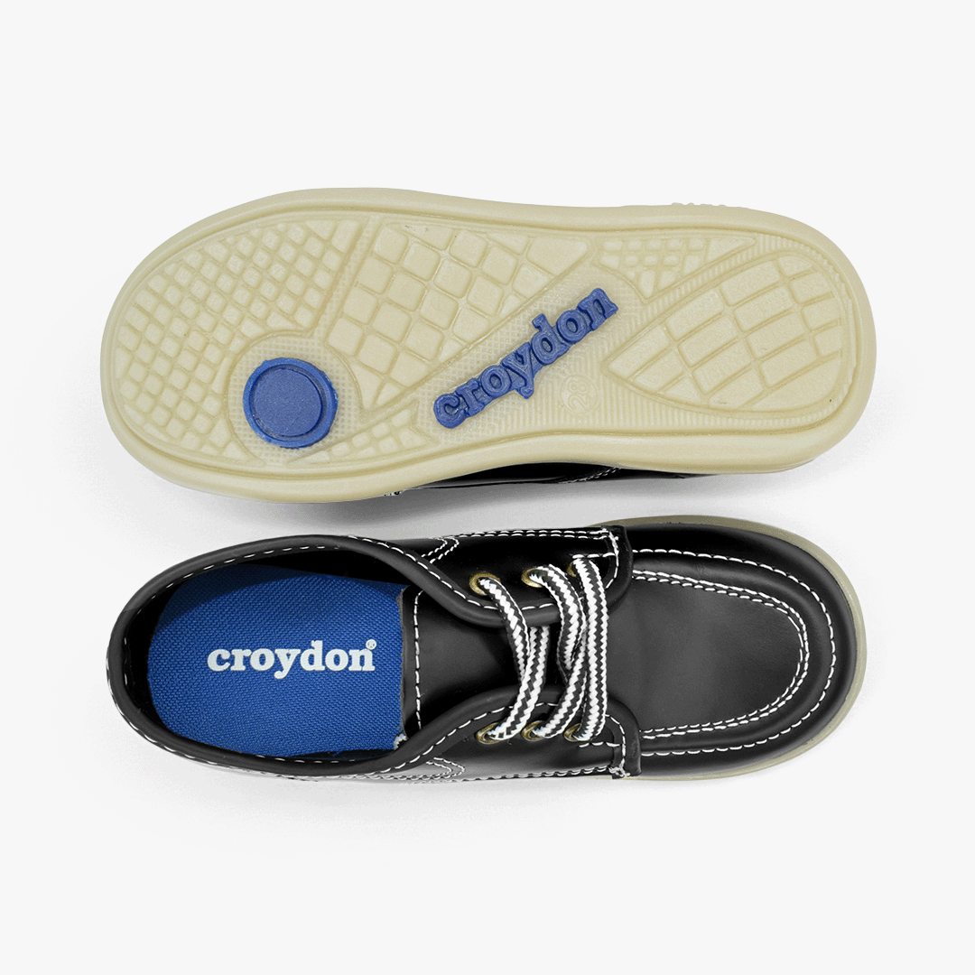 Zapato Croydon colegial unisex en color negro