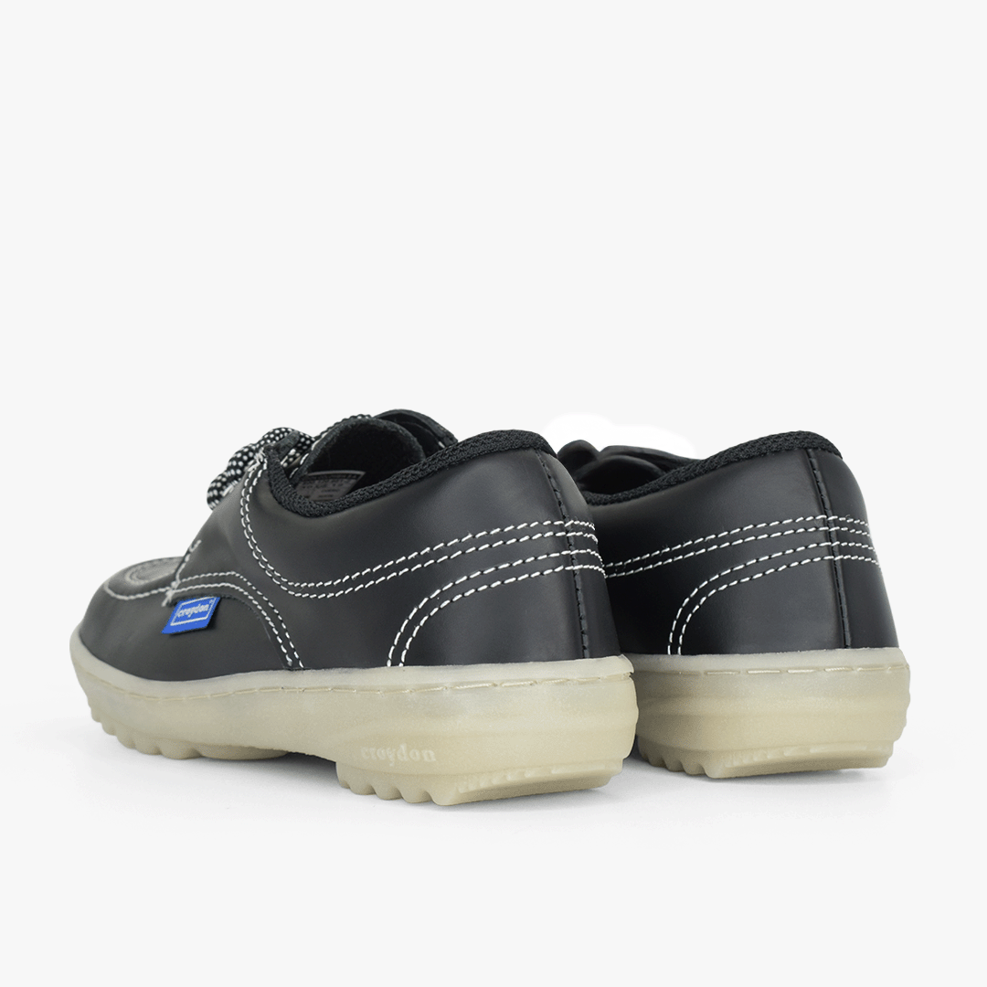 Zapato Croydon colegial unisex en color negro