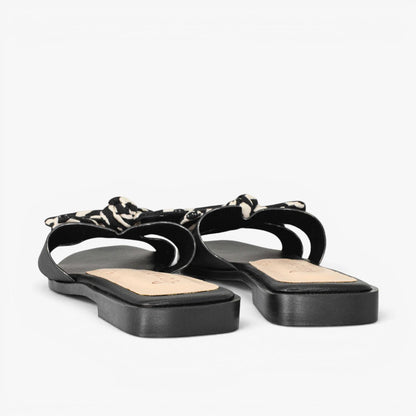 Sandalias planas para mujer en color negro